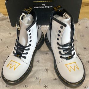 Brand new in box. Girls Dr Martens basquiat boots in US12. Sold out